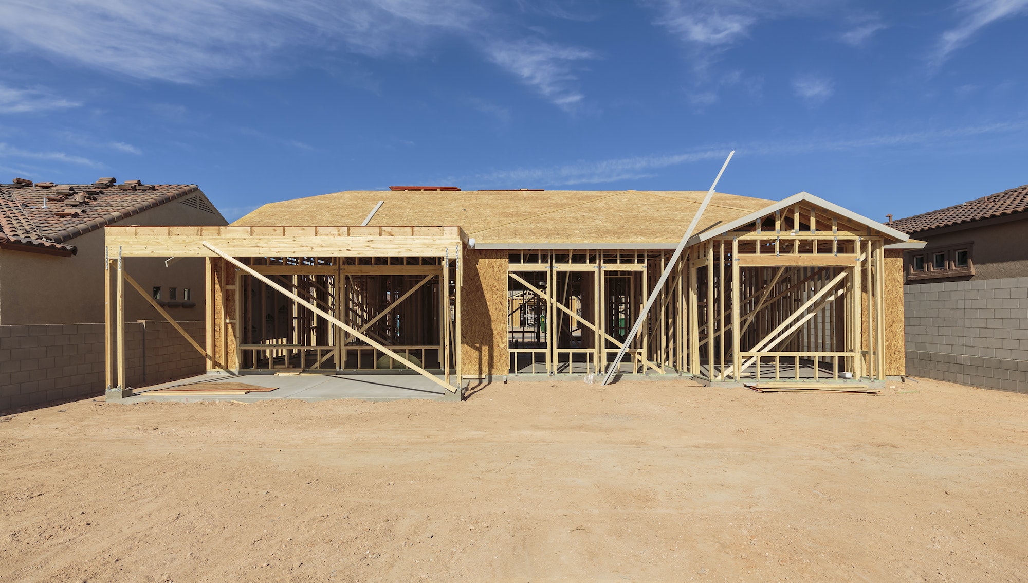Construction of house under blue sky